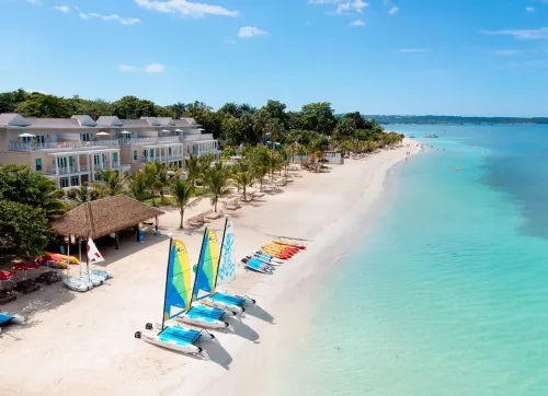 Hobie Cat kayaks on a caribbean beach resort family all inclusive resorts in the caribbean