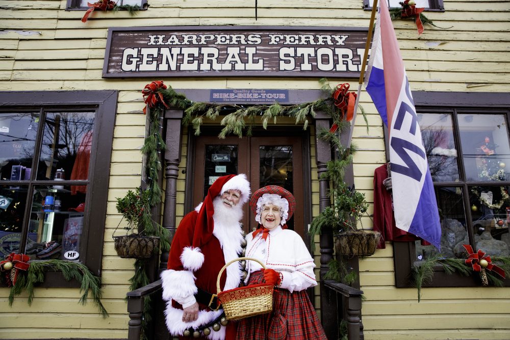 Harpers-Ferry-Christmas-west virginia mr and mrs clause outside old store front