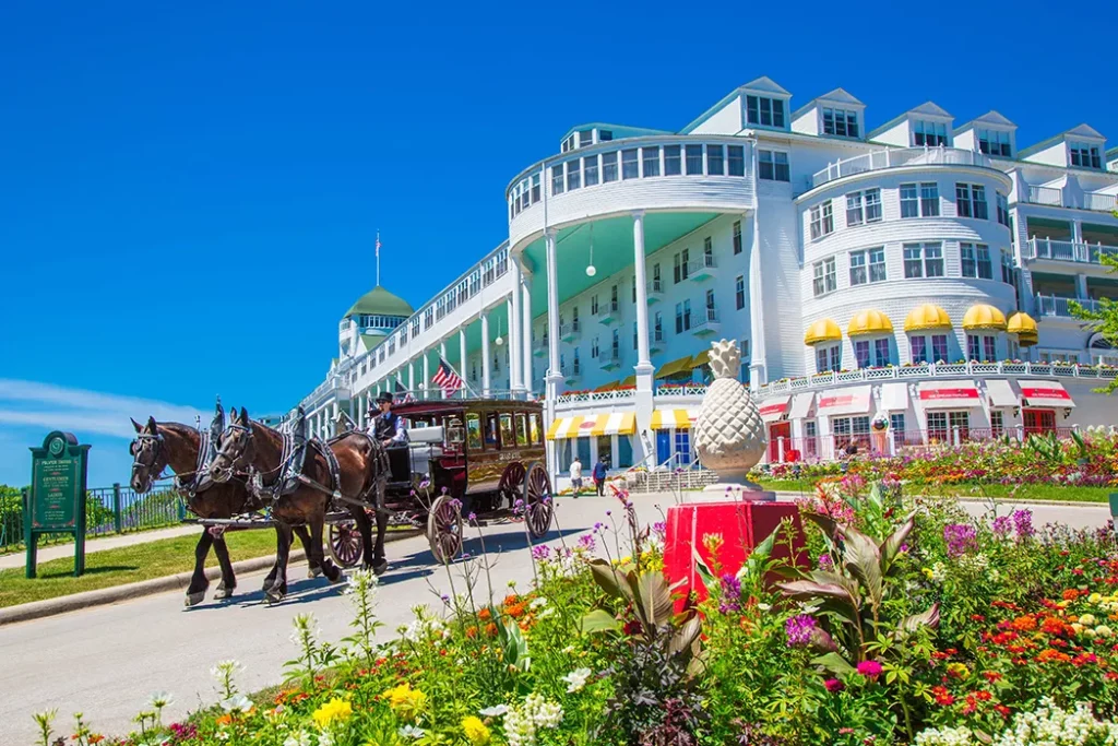 Mackinac Island Michigan, crown of the jewel horse carriage infront of grand hotel