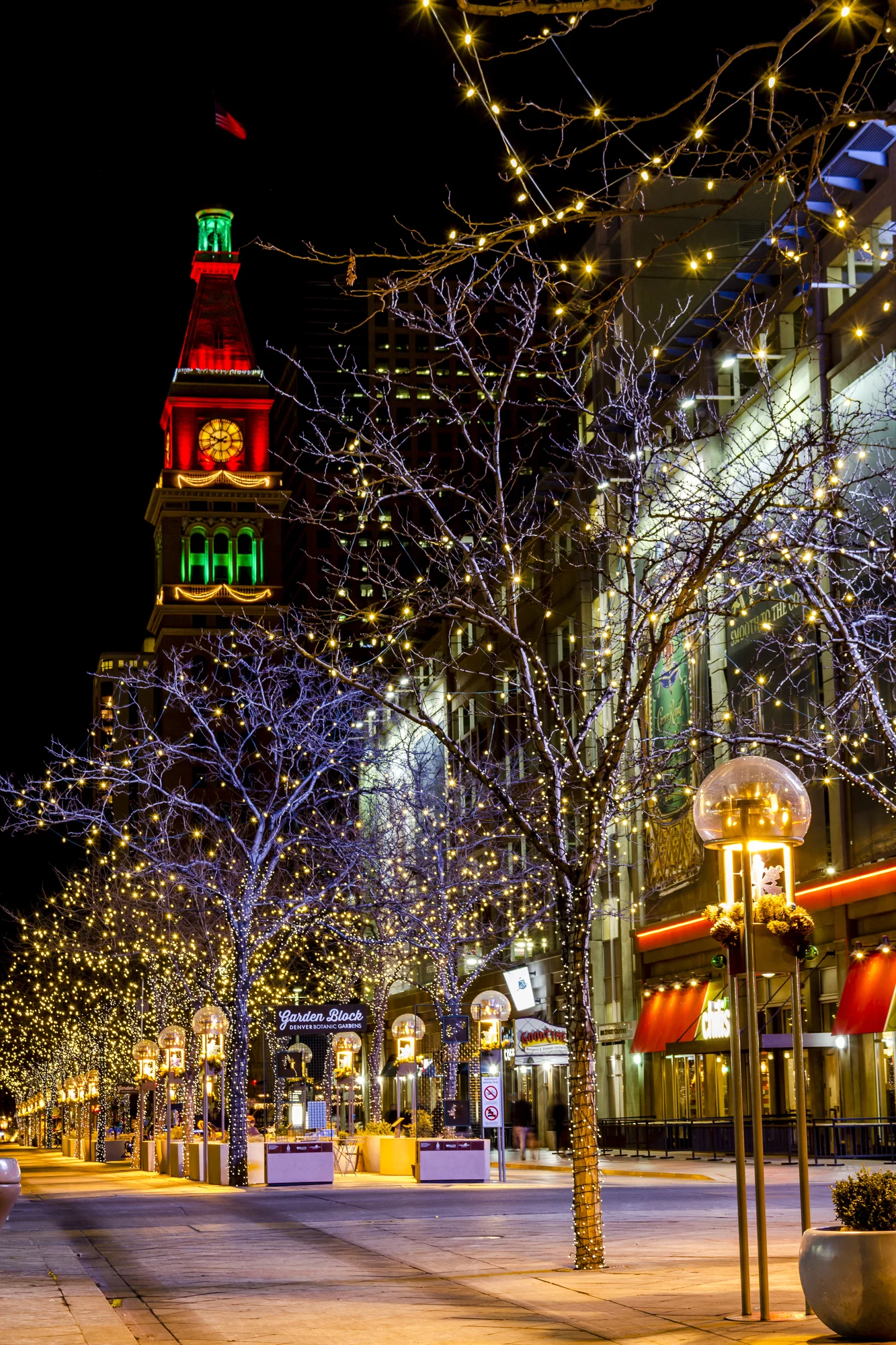 Denver Colorado town decorated for christmas street lit up town clock multi colored